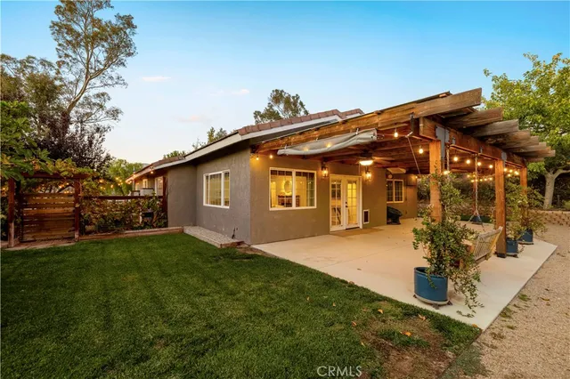 a view of a porch with furniture