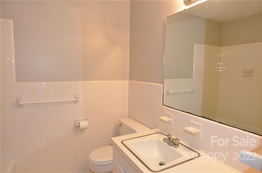 103 Sunset Drive Chester, SC 29706 - Photo 16 of 19 a bathroom with a sink a toilet and shower