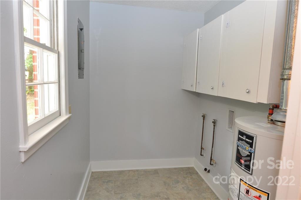 103 Sunset Drive Chester, SC 29706 - Photo 17 of 19 a view of storage and utility room with a window