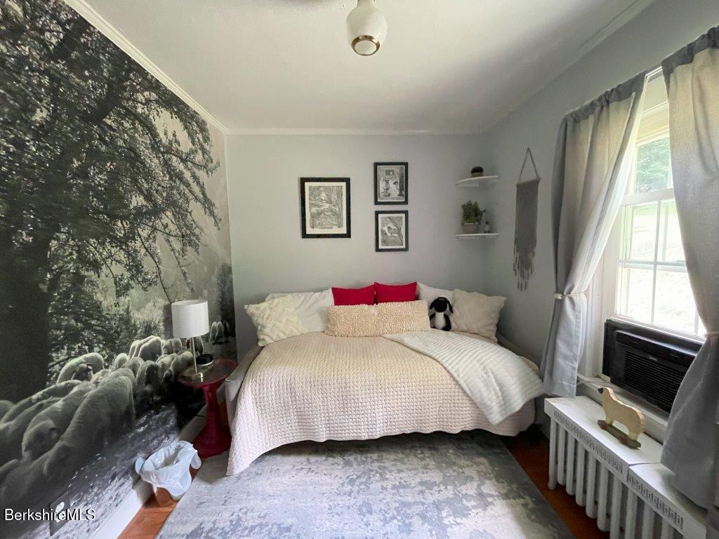 193 South Mountain Road Pittsfield, MA 01201 - Photo 20 of 49 a bedroom with a bed next to a window