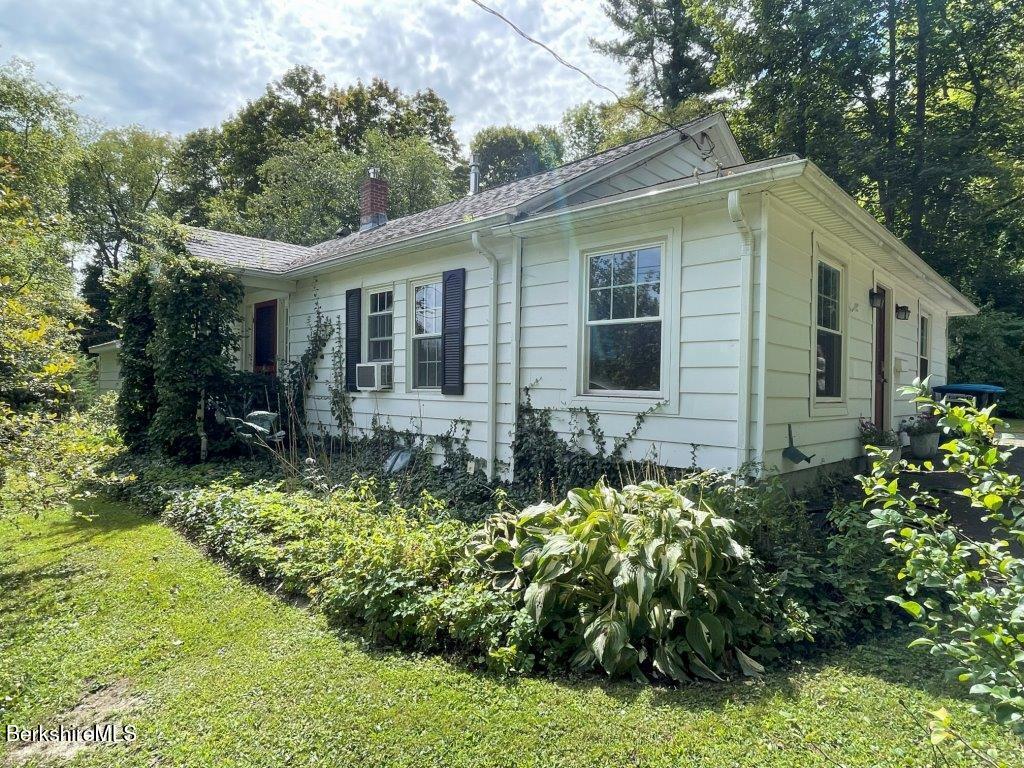 193 South Mountain Road Pittsfield, MA 01201 - Photo 2 of 49 a front view of a house with a yard