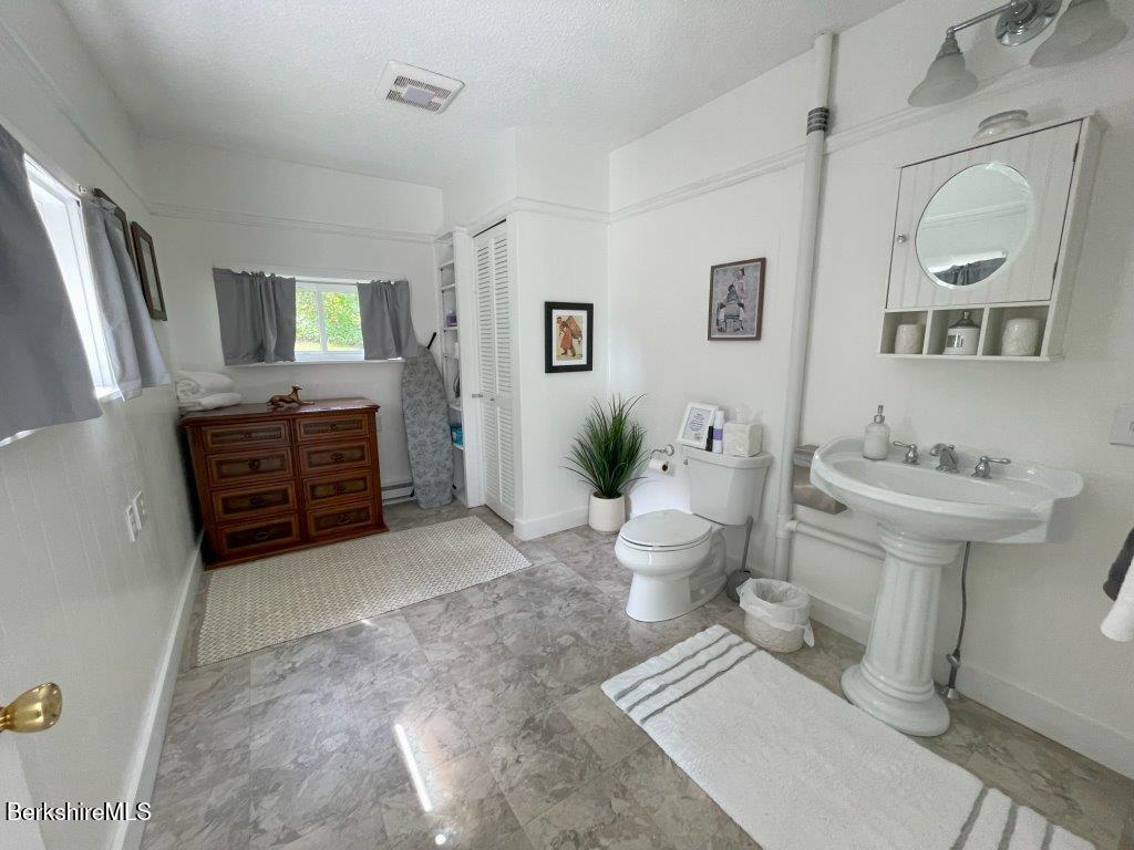 193 South Mountain Road Pittsfield, MA 01201 - Photo 21 of 49 a spacious bathroom with a sink and a mirror