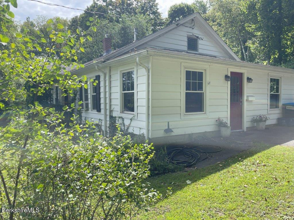 193 South Mountain Road Pittsfield, MA 01201 - Photo 25 of 49 front view of a house with a yard