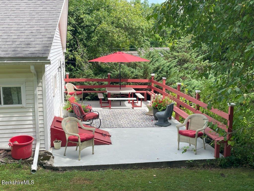 193 South Mountain Road Pittsfield, MA 01201 - Photo 30 of 49 an outdoor space with furniture and umbrella