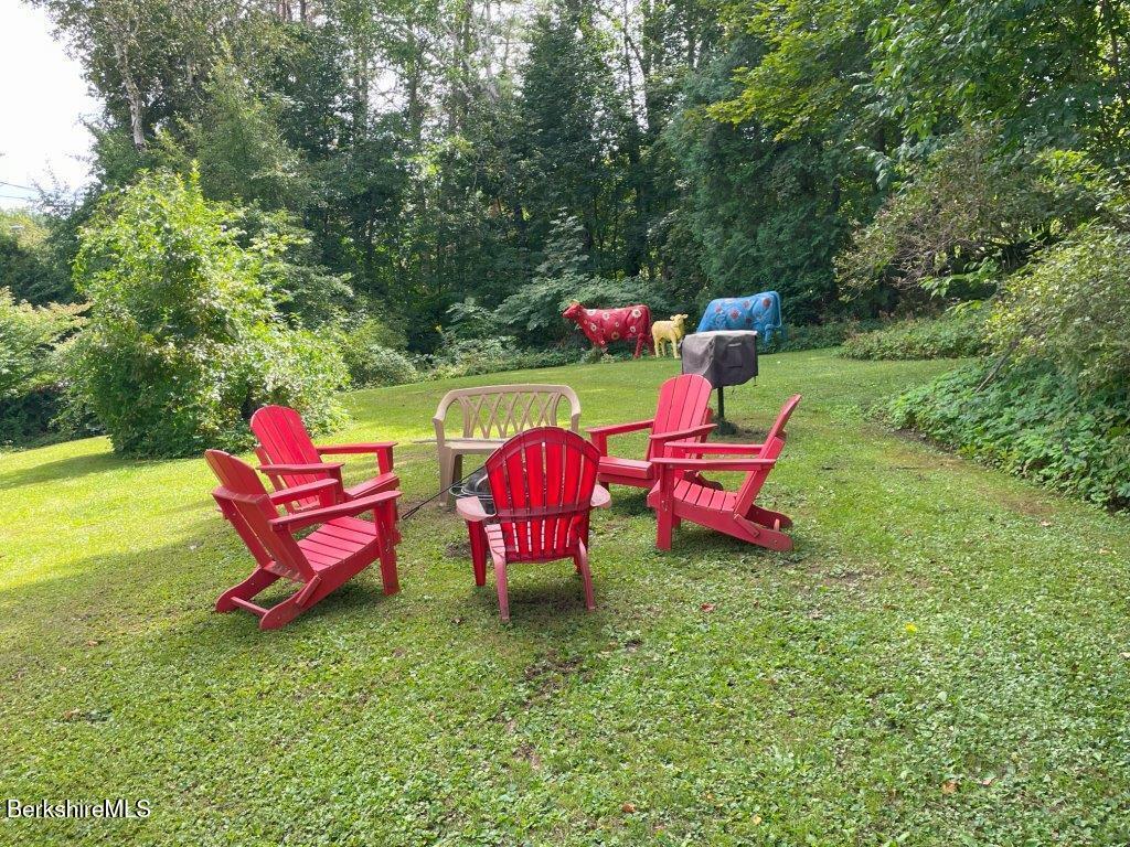 193 South Mountain Road Pittsfield, MA 01201 - Photo 34 of 49 a view of a yard with swimming pool and sitting area