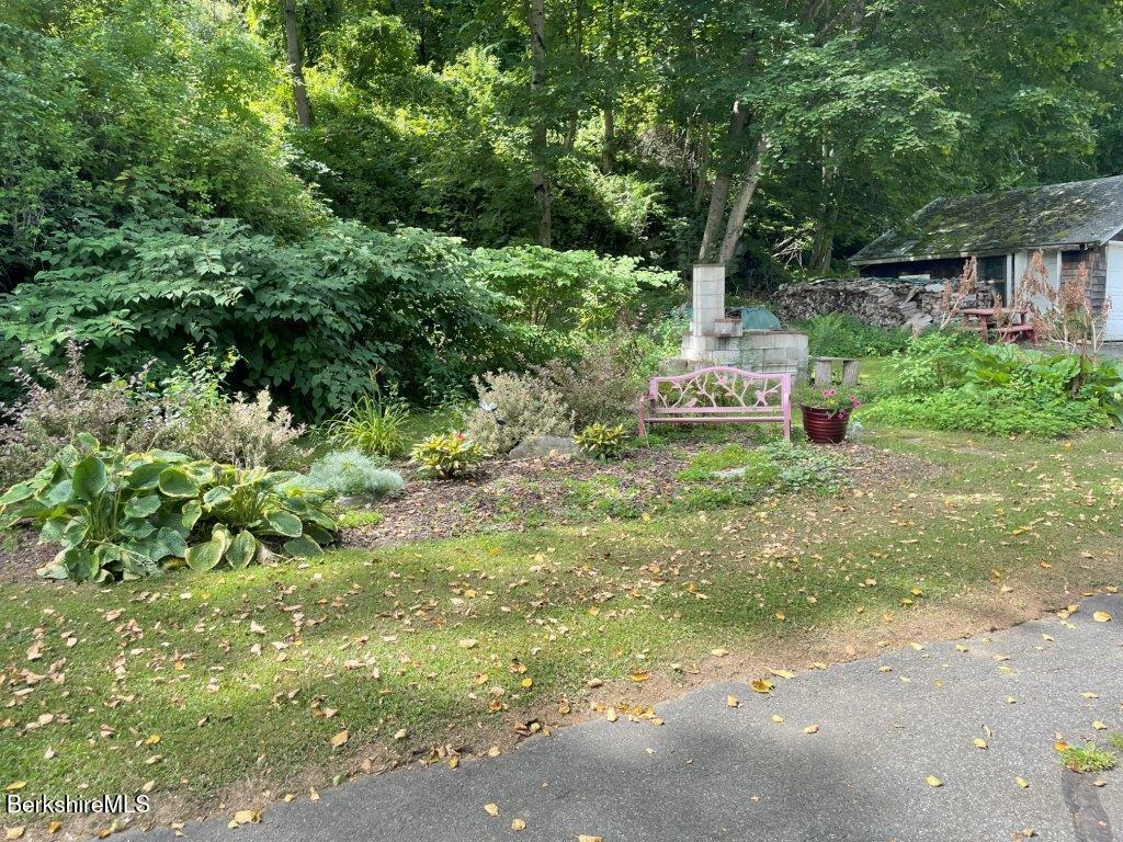 193 South Mountain Road Pittsfield, MA 01201 - Photo 44 of 49 a view of a garden with a fountain