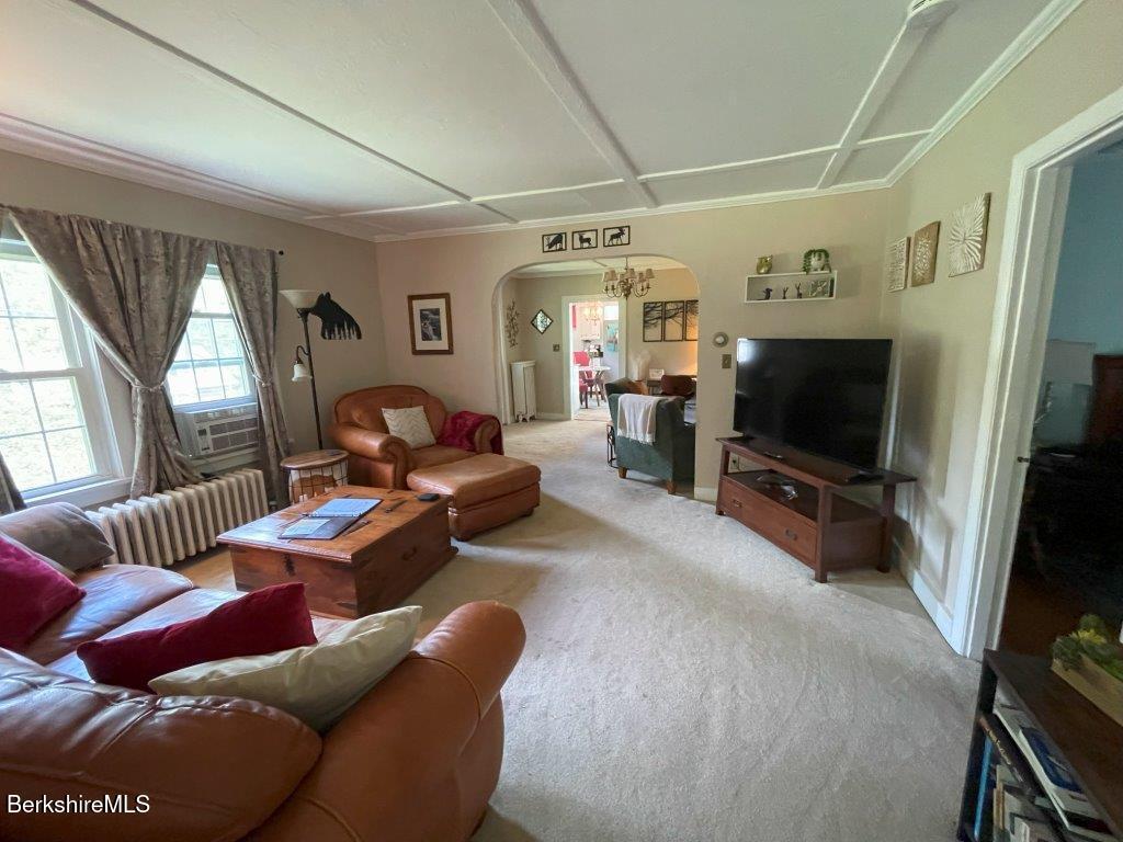 193 South Mountain Road Pittsfield, MA 01201 - Photo 7 of 49 a living room with furniture and a flat screen tv
