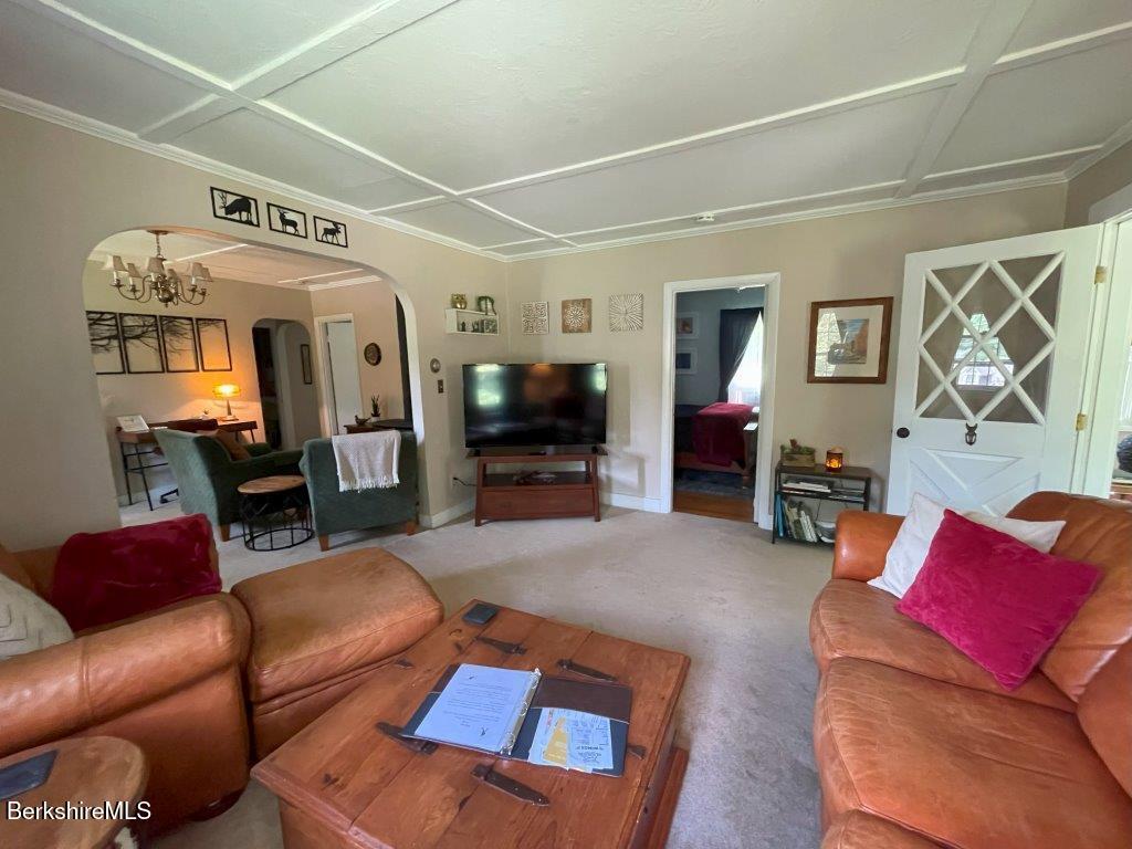 193 South Mountain Road Pittsfield, MA 01201 - Photo 9 of 49 a living room with furniture and a flat screen tv