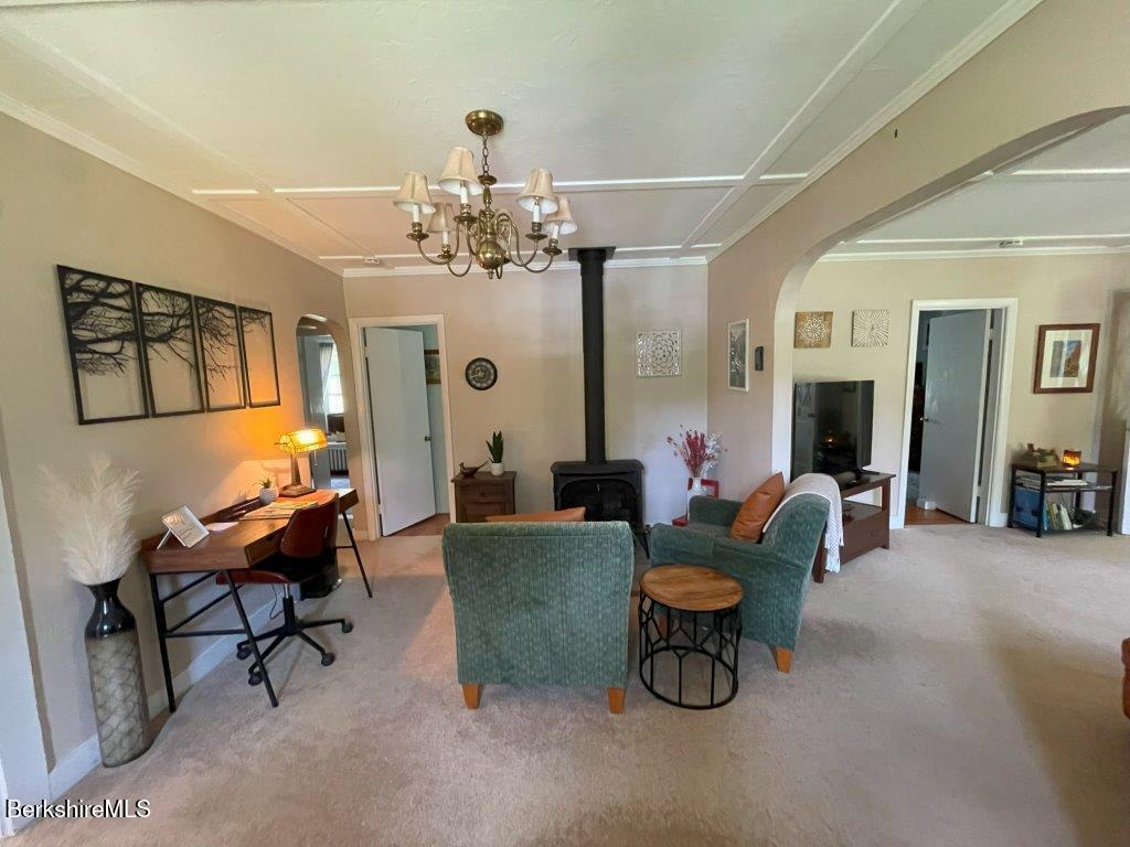 193 South Mountain Road Pittsfield, MA 01201 - Photo 10 of 49 a living room with furniture and a chandelier