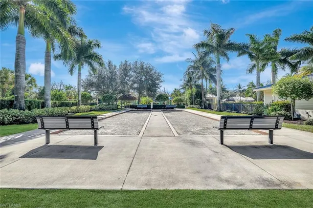 a park with bench and trees