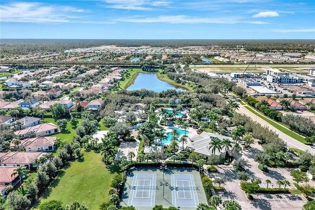 an aerial view of a house with outdoor space
