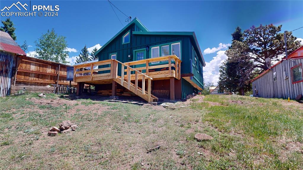 315 5th Street Victor, CO 80860 - Photo 36 of 39 a front view of a house with a yard
