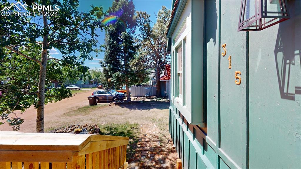 315 5th Street Victor, CO 80860 - Photo 37 of 39 a view of a patio with table and chairs and potted plants