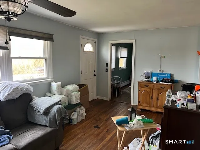a living room with furniture and a window