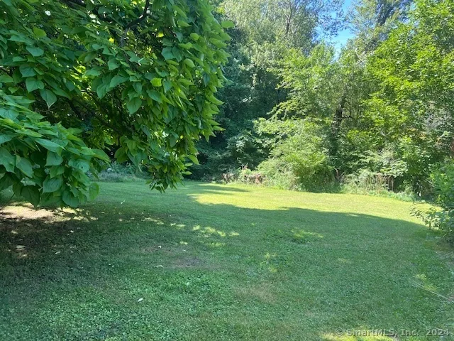 a view of outdoor space with a garden