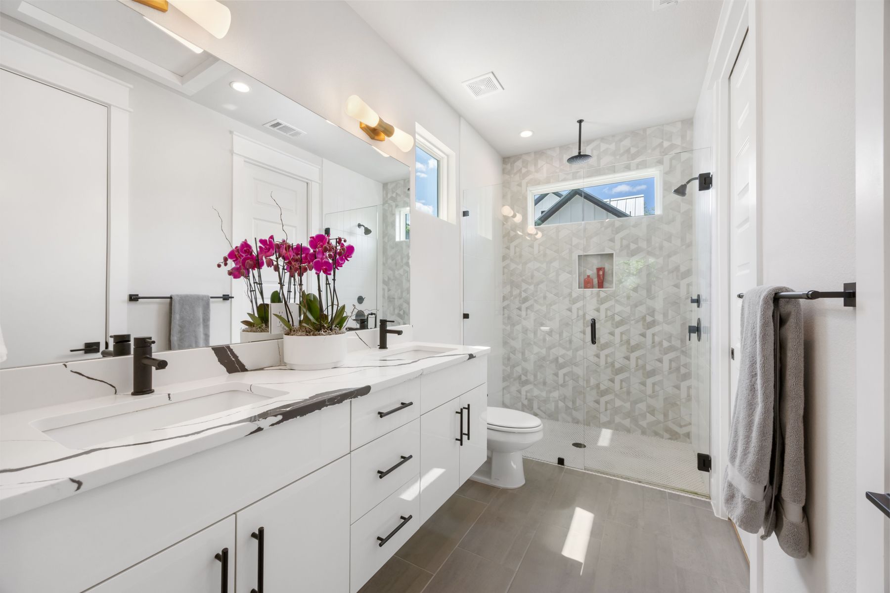 2711 Stacy Lane, Unit 2 Austin, TX 78704 - Photo 15 of 26 Full bath featuring double vanity and a shower stall