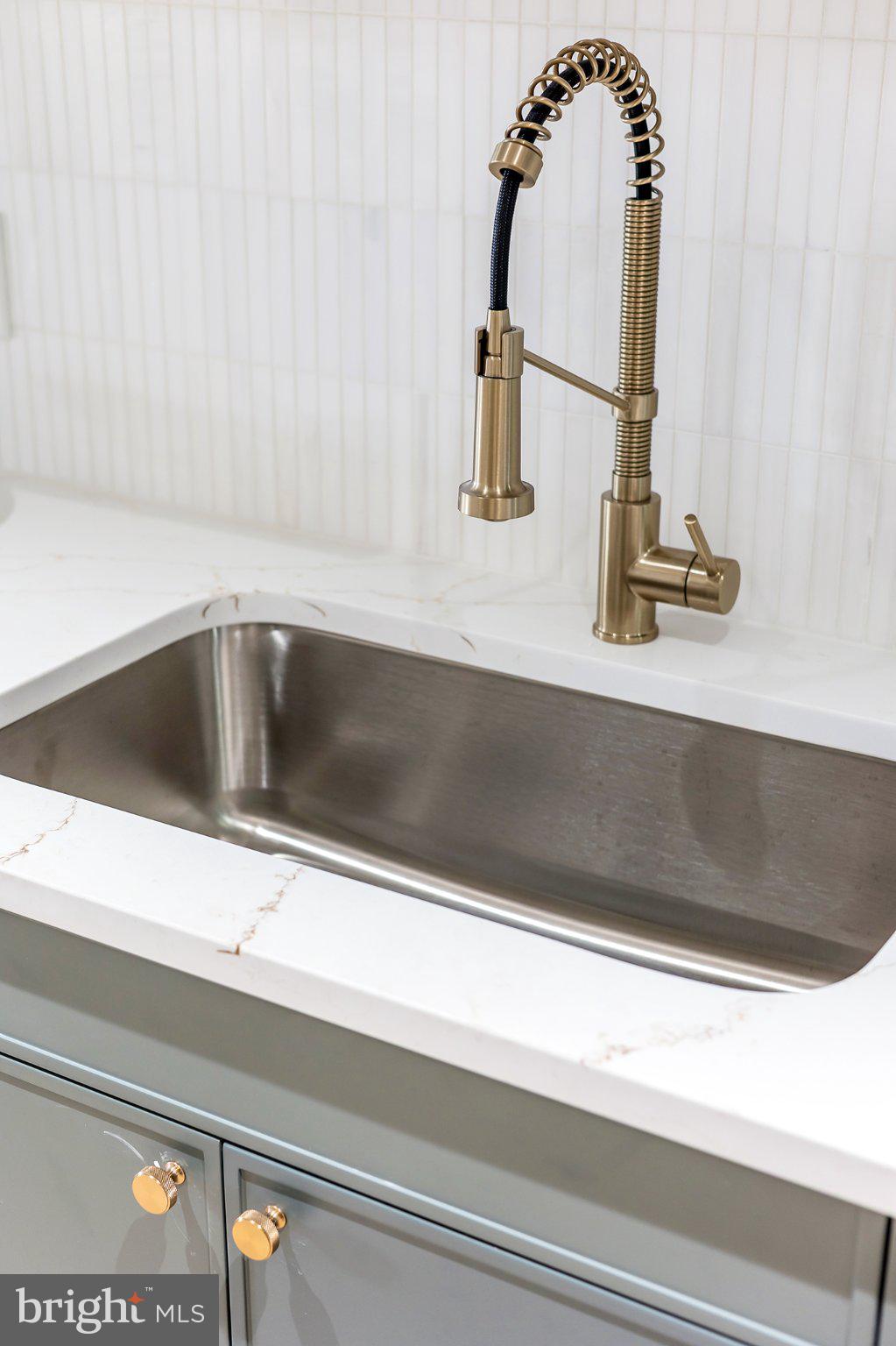 1212 4th Street Northwest, Unit 9 Washington, DC 20001 - Photo 31 of 42 a close view of sink and tap