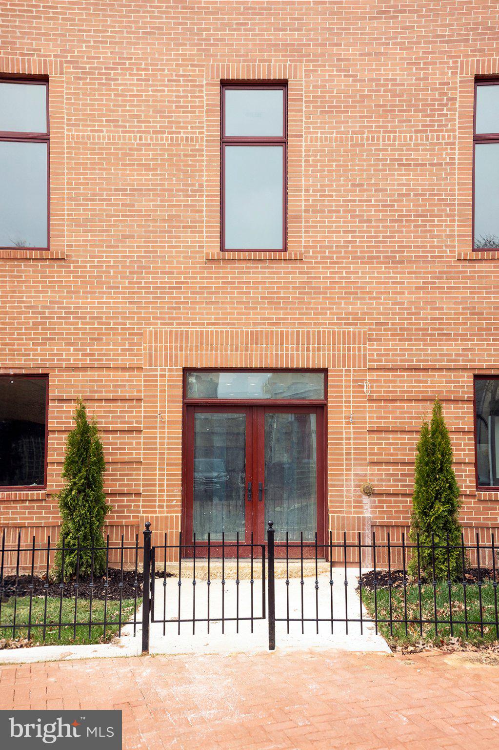 1212 4th Street Northwest, Unit 9 Washington, DC 20001 - Photo 4 of 42 a view of a brick house with a street
