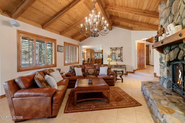 a spacious bathroom with a tub sink and mirror