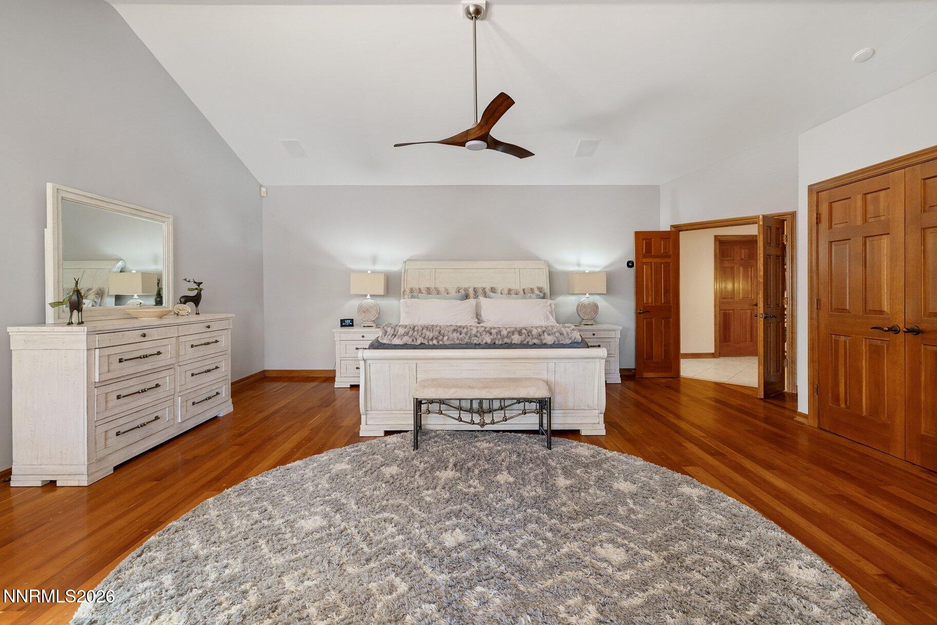 360 Sylvan Court Verdi, NV 89439 - Photo 23 of 76 a spacious bedroom with a bed and a dresser