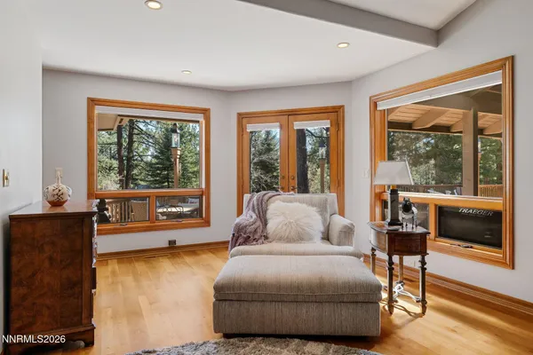 a view of a patio with a table and chairs