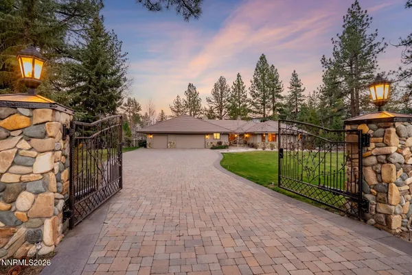 a view of a street with brick building in front of it