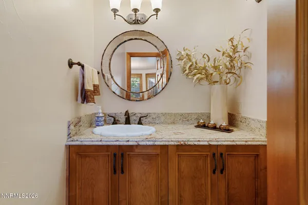 a view of a town with mountains in the background