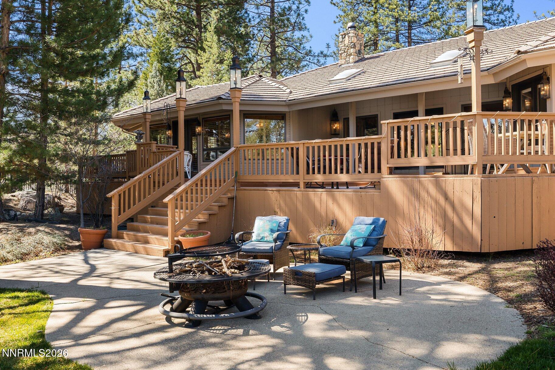 360 Sylvan Court Verdi, NV 89439 - Photo 50 of 76 a view of a patio with table and chairs and wooden floor