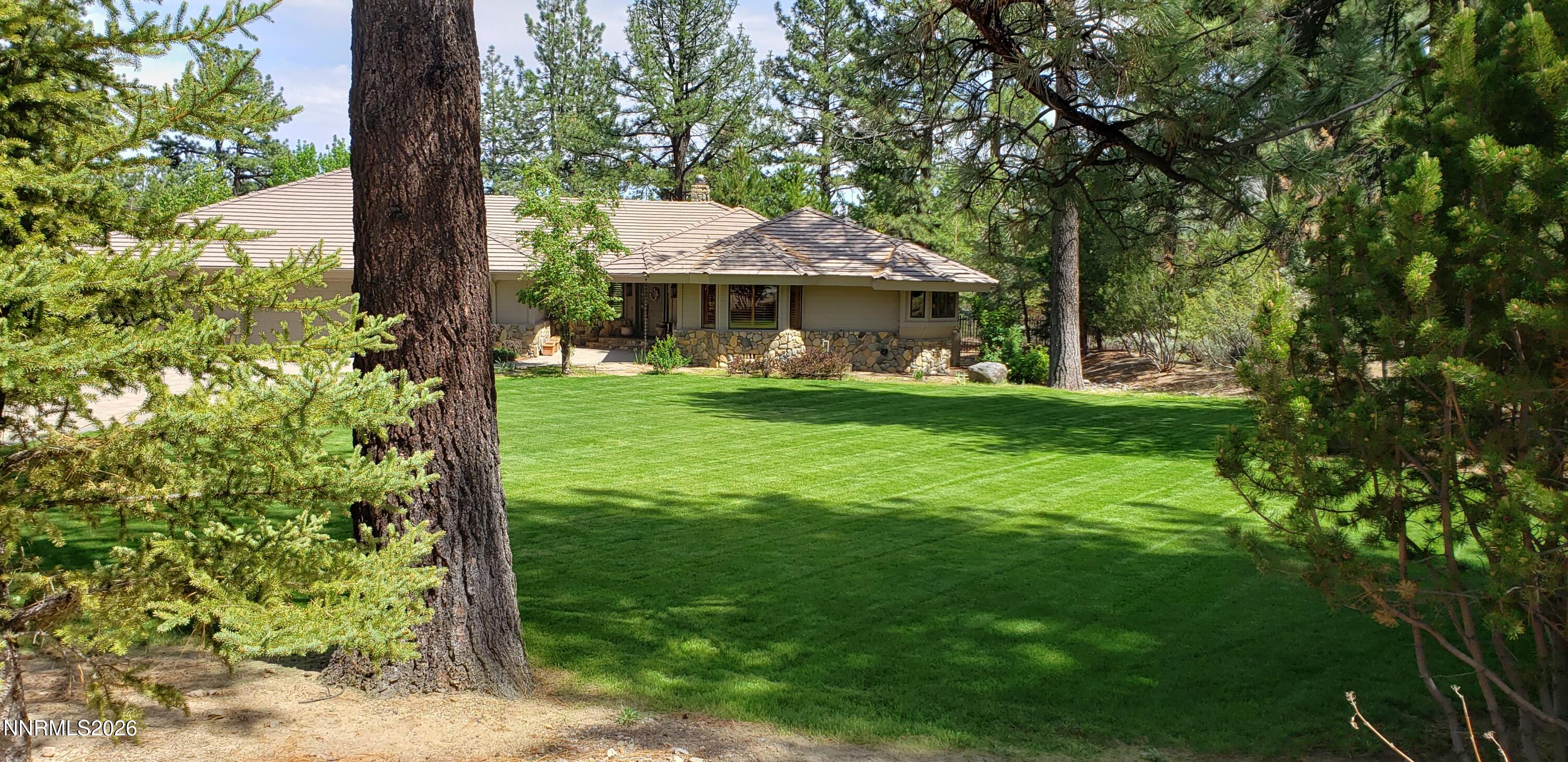 360 Sylvan Court Verdi, NV 89439 - Photo 57 of 76 a view of a house with a garden