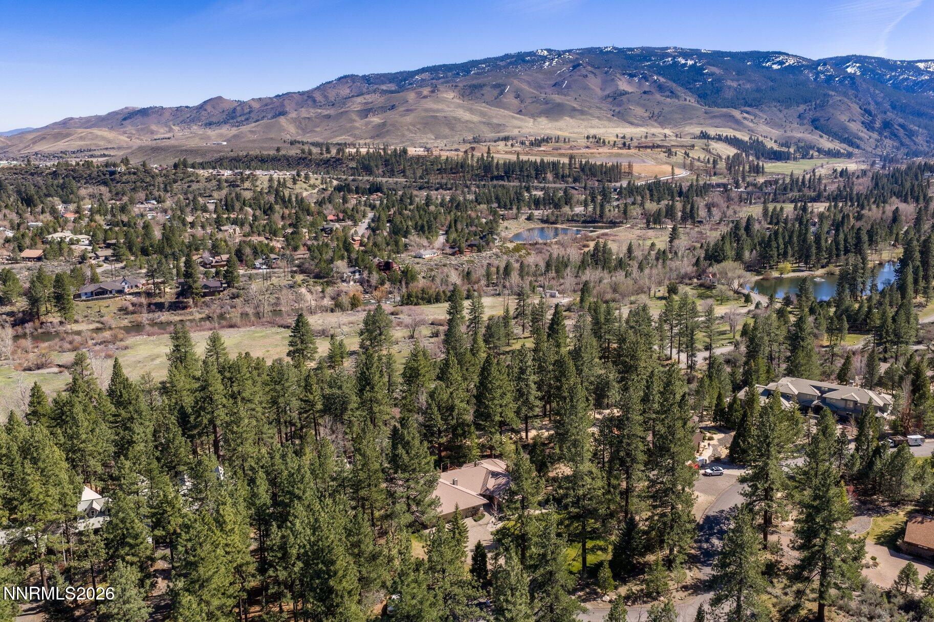 360 Sylvan Court Verdi, NV 89439 - Photo 70 of 76 a view of a lush green hillside and houses