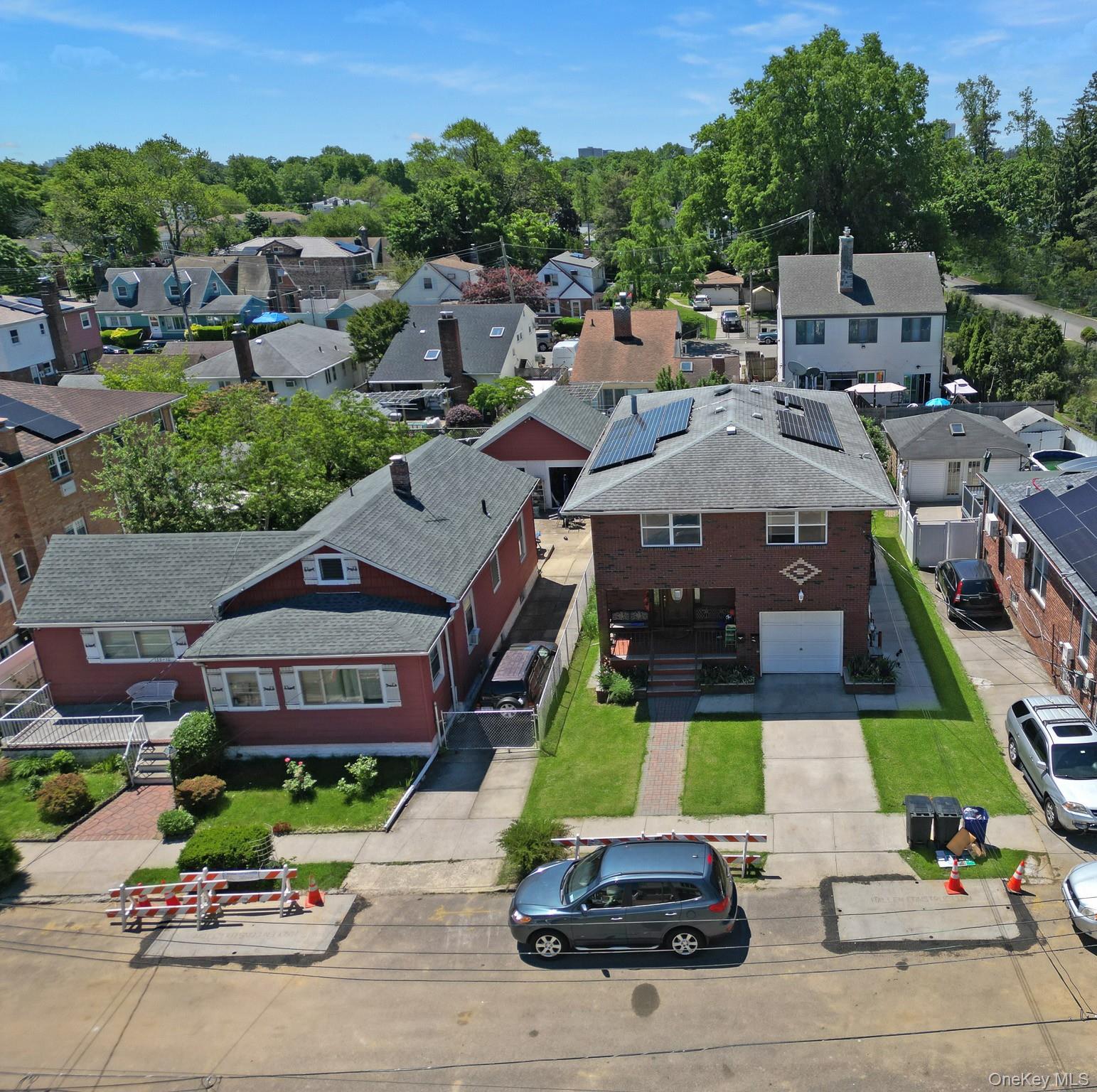 135-06 62nd Road Queens, NY 11367 - Photo 5 of 20 an aerial view of a house with a garden