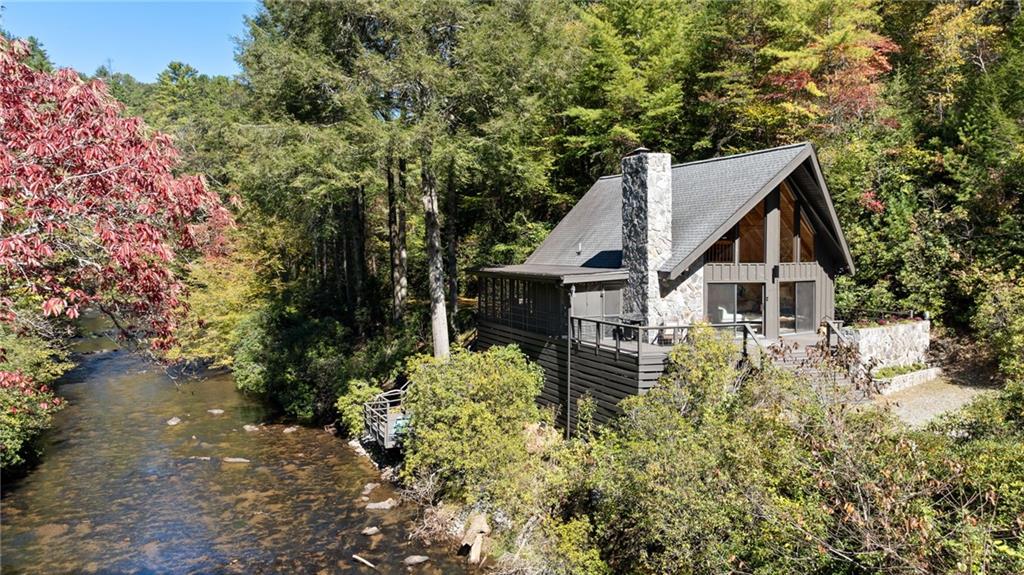 1062 River Bend Road Ellijay, GA 30540 - Photo 1 of 1 a view of a house with a yard