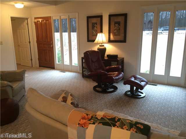 690 Bandy Road Star, NC 27356 - Photo 3 of 16 Living Room. Another view of the living room showing the full length windows which lets in extra natural light.