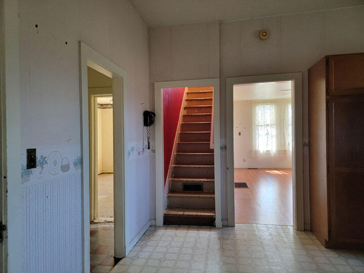 120 13th Street Arcata, CA 95521 - Photo 10 of 37 a view of hallway with stairs and wooden floor