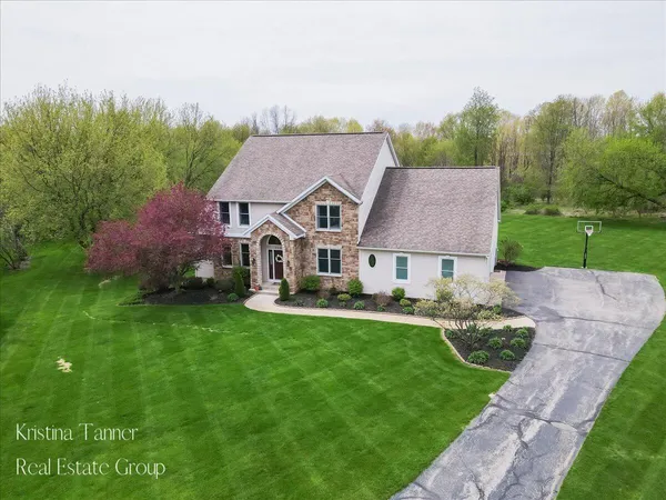 $815,000 | 4797 Sunflower Ridge Drive Northeast, Ada, MI 49301