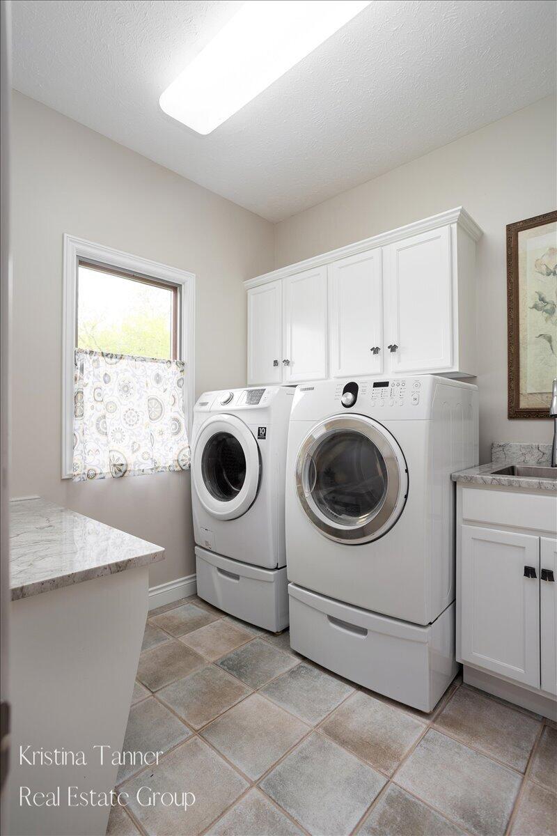 4797 Sunflower Ridge Drive Northeast Ada, MI 49301 - Photo 41 of 65 1st floor Laundry