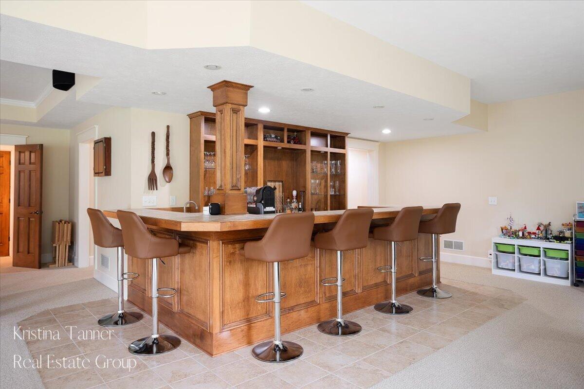 4797 Sunflower Ridge Drive Northeast Ada, MI 49301 - Photo 42 of 65 Lower Level Bar