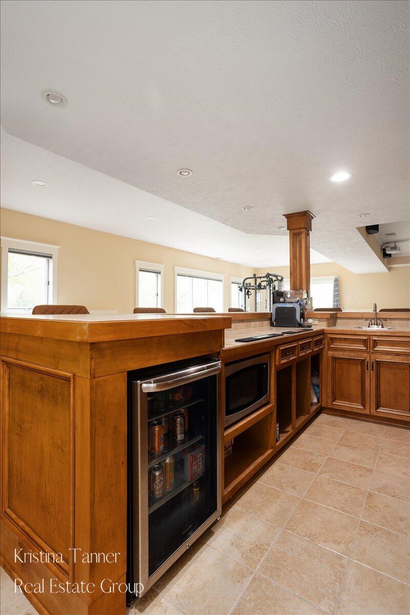 4797 Sunflower Ridge Drive Northeast Ada, MI 49301 - Photo 44 of 65 Lower Level Bar