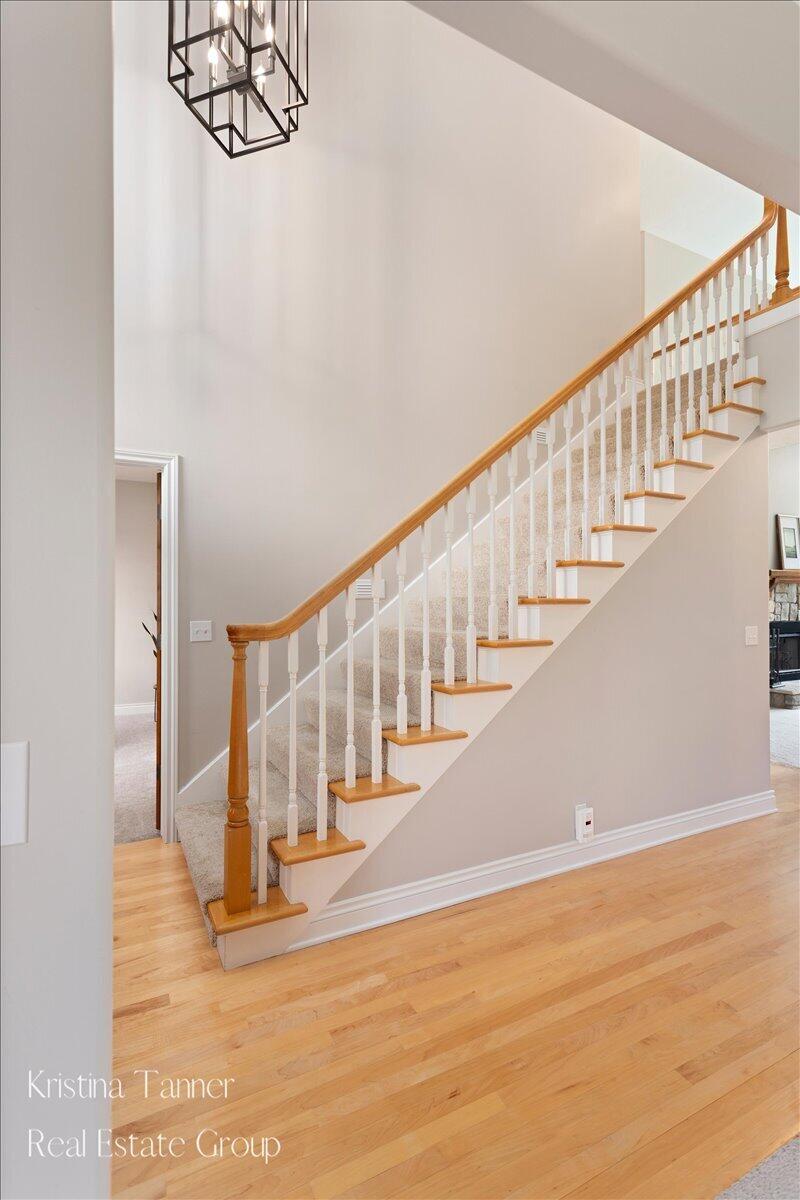 4797 Sunflower Ridge Drive Northeast Ada, MI 49301 - Photo 6 of 65 Grand Staircase