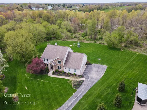 $815,000 | 4797 Sunflower Ridge Drive Northeast, Ada, MI 49301