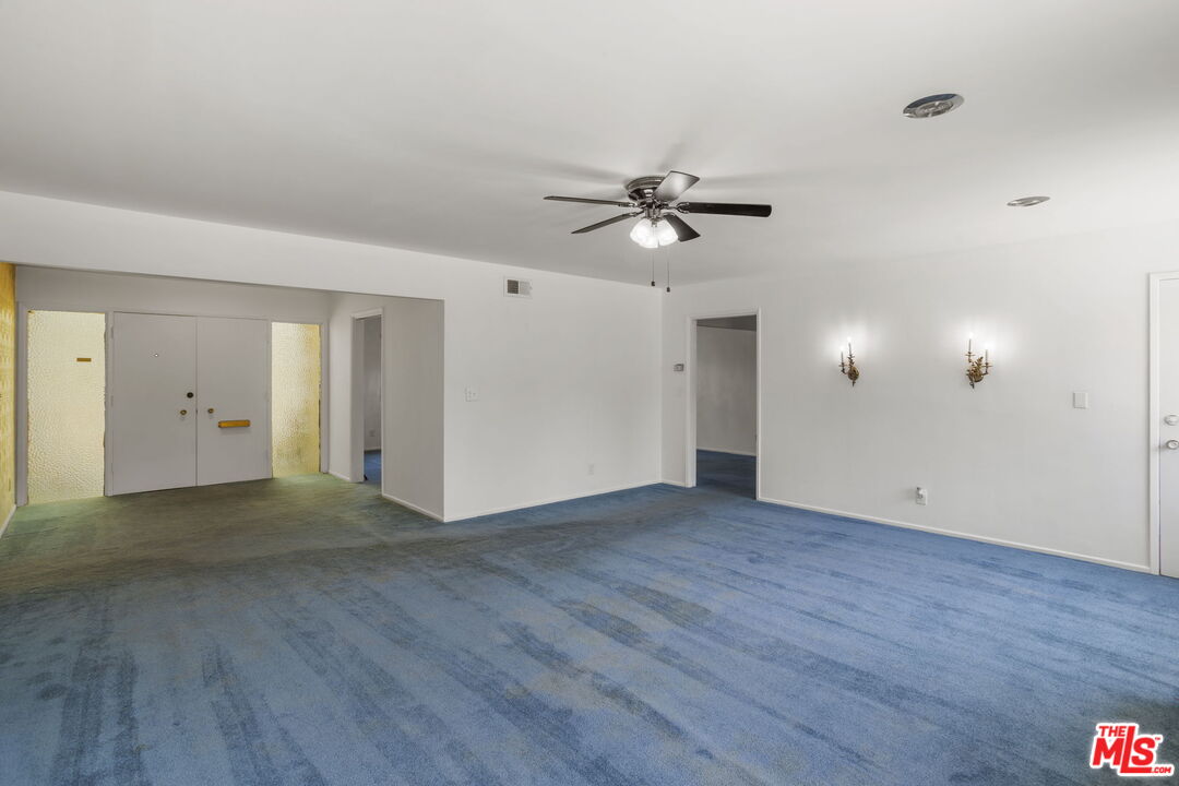 5279 Falkirk Avenue Riverside, CA 92506 - Photo 12 of 44 a view of an empty room with wooden floor