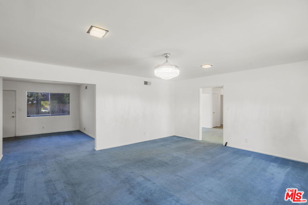 5279 Falkirk Avenue Riverside, CA 92506 - Photo 17 of 44 an empty room with a empty space and window