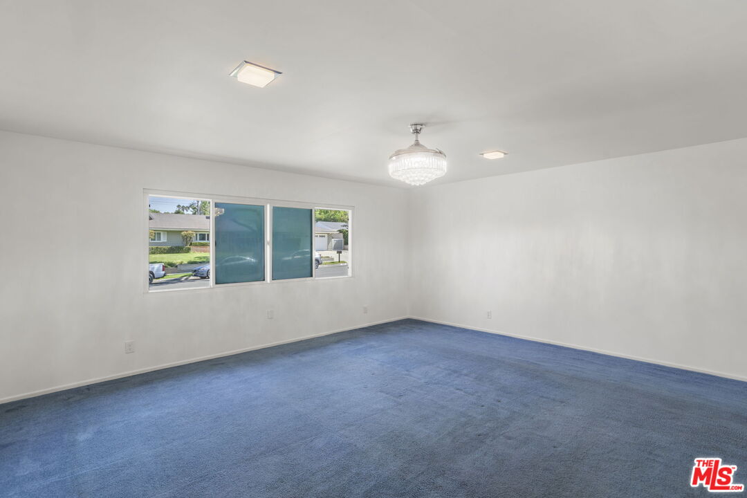 5279 Falkirk Avenue Riverside, CA 92506 - Photo 18 of 44 an empty room with windows