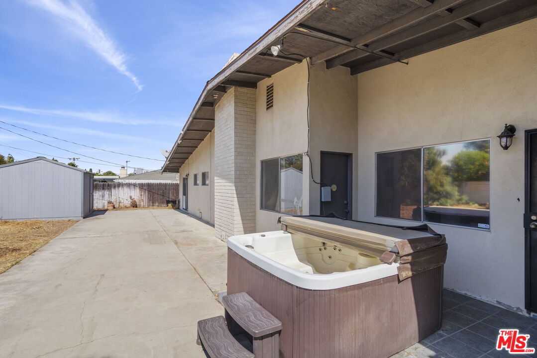5279 Falkirk Avenue Riverside, CA 92506 - Photo 26 of 44 a view of a house with a tub and wooden floor
