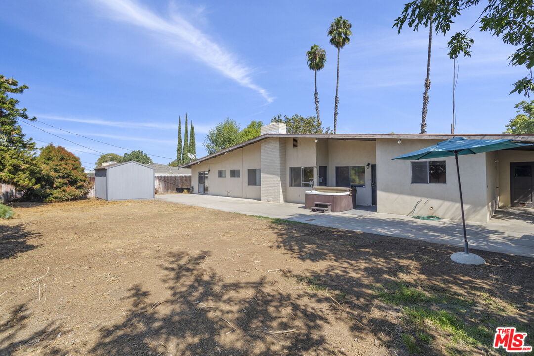 5279 Falkirk Avenue Riverside, CA 92506 - Photo 28 of 44 a front view of a house with a yard and garage