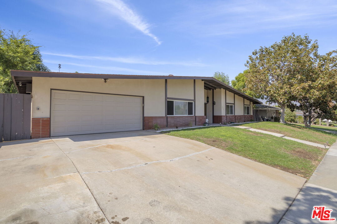 5279 Falkirk Avenue Riverside, CA 92506 - Photo 3 of 44 a front view of house with yard and trees