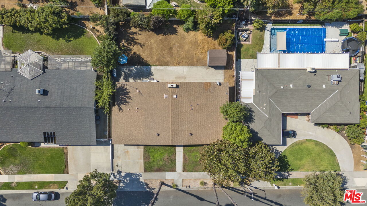 5279 Falkirk Avenue Riverside, CA 92506 - Photo 35 of 44 an aerial view of a house with a yard and a large tree