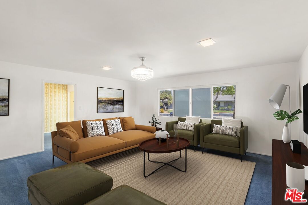 5279 Falkirk Avenue Riverside, CA 92506 - Photo 4 of 44 a living room with furniture and a large window