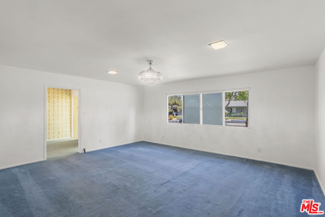 5279 Falkirk Avenue Riverside, CA 92506 - Photo 5 of 44 an empty room with windows