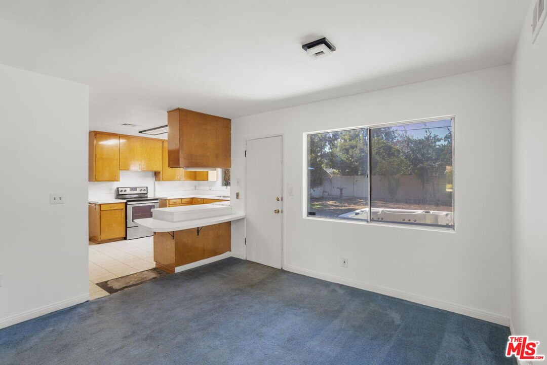 5279 Falkirk Avenue Riverside, CA 92506 - Photo 7 of 44 a large white room with a large window